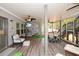 Relaxing sunroom with seating, a mini-golf putting area, and great light at 624 Hemlock Trl, Canton, GA 30114