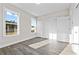 Bright bedroom with hardwood floors, natural light, and closet storage at 697 Fayetteville Rd # 303, Atlanta, GA 30316