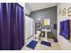 Bathroom with blue curtains and towels, a pedestal sink, and modern fixtures at 509 Chestnut Oak Dr, Palmetto, GA 30268