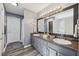 Elegant bathroom showcasing double sinks with granite countertops and modern fixtures at 509 Chestnut Oak Dr, Palmetto, GA 30268