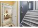 Inviting entryway featuring staircase and doorway to living room at 509 Chestnut Oak Dr, Palmetto, GA 30268