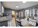 Charming eat-in kitchen with stainless steel appliances and dining table with chairs at 509 Chestnut Oak Dr, Palmetto, GA 30268