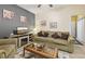 Inviting living room with plush seating and a media center with a fireplace at 509 Chestnut Oak Dr, Palmetto, GA 30268