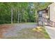 Spacious yard with mature trees and easy access to the home at 509 Chestnut Oak Dr, Palmetto, GA 30268