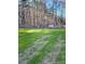 Fenced backyard with a garden house at 625 Huiet Dr, Mcdonough, GA 30252