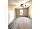 Bright and airy bedroom with neutral walls, carpeted floors, and a window for natural light at 625 Huiet Dr, Mcdonough, GA 30252