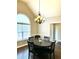 Dining room with large window and overhead light fixture at 625 Huiet Dr, Mcdonough, GA 30252