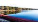 Community lake and dock offers a peaceful waterfront retreat for residents at 625 Huiet Dr, Mcdonough, GA 30252