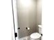 Powder room featuring modern fixtures and a neutral color scheme for a clean and simple design at 625 Huiet Dr, Mcdonough, GA 30252