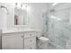 Modern bathroom featuring a glass shower, marble tile, and vanity at 120 Pine Mist Cir, Alpharetta, GA 30022