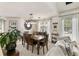 Bright dining room featuring a wood table, natural lighting, and decor at 1252 Highfield Dr, Lawrenceville, GA 30043