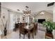 Bright dining room featuring a wood table and modern light fixture at 1252 Highfield Dr, Lawrenceville, GA 30043