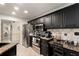 Stylish kitchen featuring stainless steel appliances and granite countertops at 1252 Highfield Dr, Lawrenceville, GA 30043