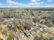 Expansive aerial view captures the property's location with city skyline in the distance, surrounded by trees and neighborhood at 1891 W Forrest Ave, Atlanta, GA 30344