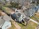 Overhead view of the home, landscaped front yard, private driveway and detached garage at 1891 W Forrest Ave, Atlanta, GA 30344