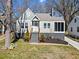 Charming renovated bungalow featuring gray siding, white trim, and a welcoming front porch at 1891 W Forrest Ave, Atlanta, GA 30344