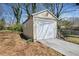 Exterior shot of detached single car garage and driveway at 1891 W Forrest Ave, Atlanta, GA 30344