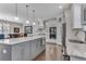 Bright kitchen with island, granite countertops, stainless appliances, and breakfast bar at 2880 Stonehall Ct # 2, Atlanta, GA 30339