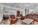 Large living room with plush seating, hardwood floors, and elegant decor at 2880 Stonehall Ct # 2, Atlanta, GA 30339