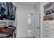 Spacious walk-in closet with custom shelving and storage leading to an ensuite bathroom at 2880 Stonehall Ct # 2, Atlanta, GA 30339