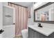 Stylish powder room with modern fixtures, chic decor and a shower tub combo at 3655 Habersham Ne Rd # B148, Atlanta, GA 30305