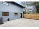 Backyard features a grey painted exterior and newly installed natural wood fence at 1120 Taliwa Ne Trl, Marietta, GA 30068