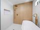 Bright bathroom featuring a walk-in shower with rainfall showerhead and a freestanding bathtub at 1120 Taliwa Ne Trl, Marietta, GA 30068