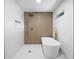 Modern bathroom featuring a soaking tub, rainfall shower head, and minimalist design at 1120 Taliwa Ne Trl, Marietta, GA 30068