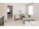 Bright loft featuring plush chairs and plenty of natural light at 1616 Aiden Way # 65, Conyers, GA 30013