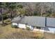 Aerial view of the house showing the roof, yard, and surrounding trees at 170 Roberts Rd, Covington, GA 30016
