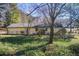 Backyard view showing the side of the house and fencing at 170 Roberts Rd, Covington, GA 30016