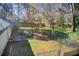 Spacious backyard with chain link fence and mature trees at 170 Roberts Rd, Covington, GA 30016
