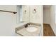 Bathroom with a granite countertop sink, tile and modern design at 170 Roberts Rd, Covington, GA 30016