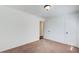 Bedroom with carpet, closet, and a door leading to the hallway at 170 Roberts Rd, Covington, GA 30016