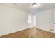 Serene bedroom with hardwood floors, window, and a calming atmosphere at 170 Roberts Rd, Covington, GA 30016