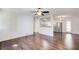 Open-concept living room showcasing wood flooring, bright walls, and an open view of the kitchen at 170 Roberts Rd, Covington, GA 30016