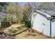 Side yard view featuring the exterior of the home with vinyl siding at 170 Roberts Rd, Covington, GA 30016