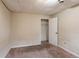 Bedroom with a closet and neutral walls at 123 Williamsburg Ln, Woodstock, GA 30189