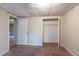 Bedroom with closet space and doorways to other rooms at 123 Williamsburg Ln, Woodstock, GA 30189