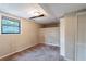 Bedroom featuring a window and closet space at 123 Williamsburg Ln, Woodstock, GA 30189