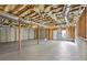 Large unfinished basement showcasing exposed insulation, ductwork, and concrete walls, offering a customizable space at 211 Garden W Walk, Hampton, GA 30228