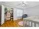 Charming bedroom featuring a closet with built-in storage and a large window at 301 Madison Se Ct, Smyrna, GA 30080