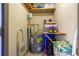 Storage closet with water heater, shelving, and room to organize personal items at 301 Madison Se Ct, Smyrna, GA 30080