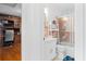 Bathroom featuring a clean white vanity and a shower with heron-themed sliding glass doors at 3140 Westmart Ln, Atlanta, GA 30340