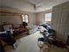 Bedroom featuring two windows, ceiling fan with lights, and lots of open space at 6575 Riley Rd, Cumming, GA 30028