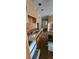 Kitchen area with wooden cabinets, drawers, and ample storage space showcasing natural light at 6575 Riley Rd, Cumming, GA 30028