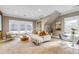 Living area featuring neutral tones, plush carpeting, recessed lighting, and natural light from large windows at 1330 Lanier Ne Blvd, Atlanta, GA 30306