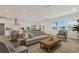 Spacious living room with an open floor plan, including kitchen and dining areas at 237 Kindness Cir, Mcdonough, GA 30252