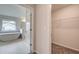 En-suite bathroom featuring a soaking tub and access to walk-in closet at 308 Moab Ct, Stockbridge, GA 30281