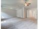 Large bedroom with neutral carpet, a ceiling fan, and recessed lighting at 308 Moab Ct, Stockbridge, GA 30281